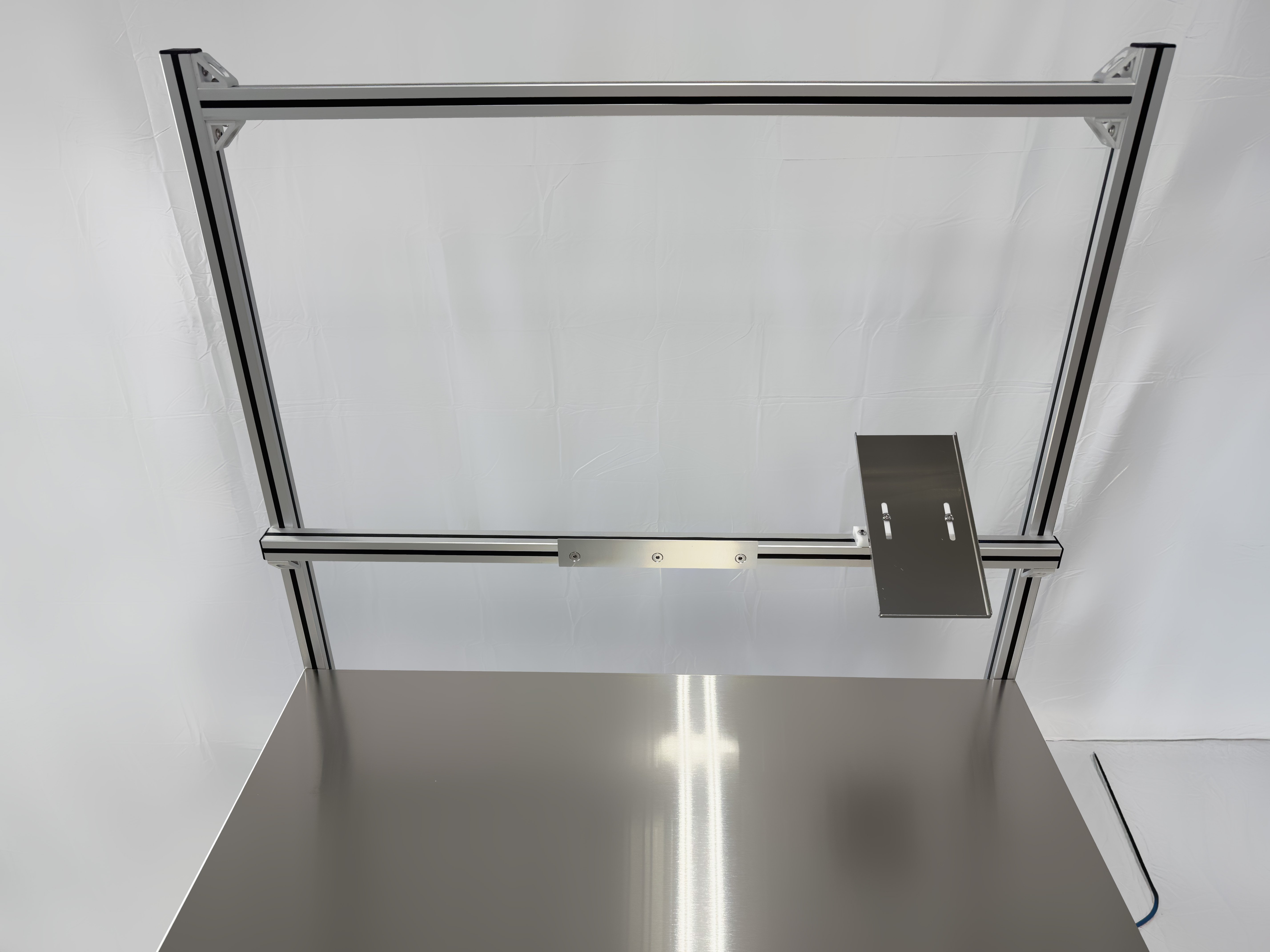 Top view of medical workstation with attachment shelf