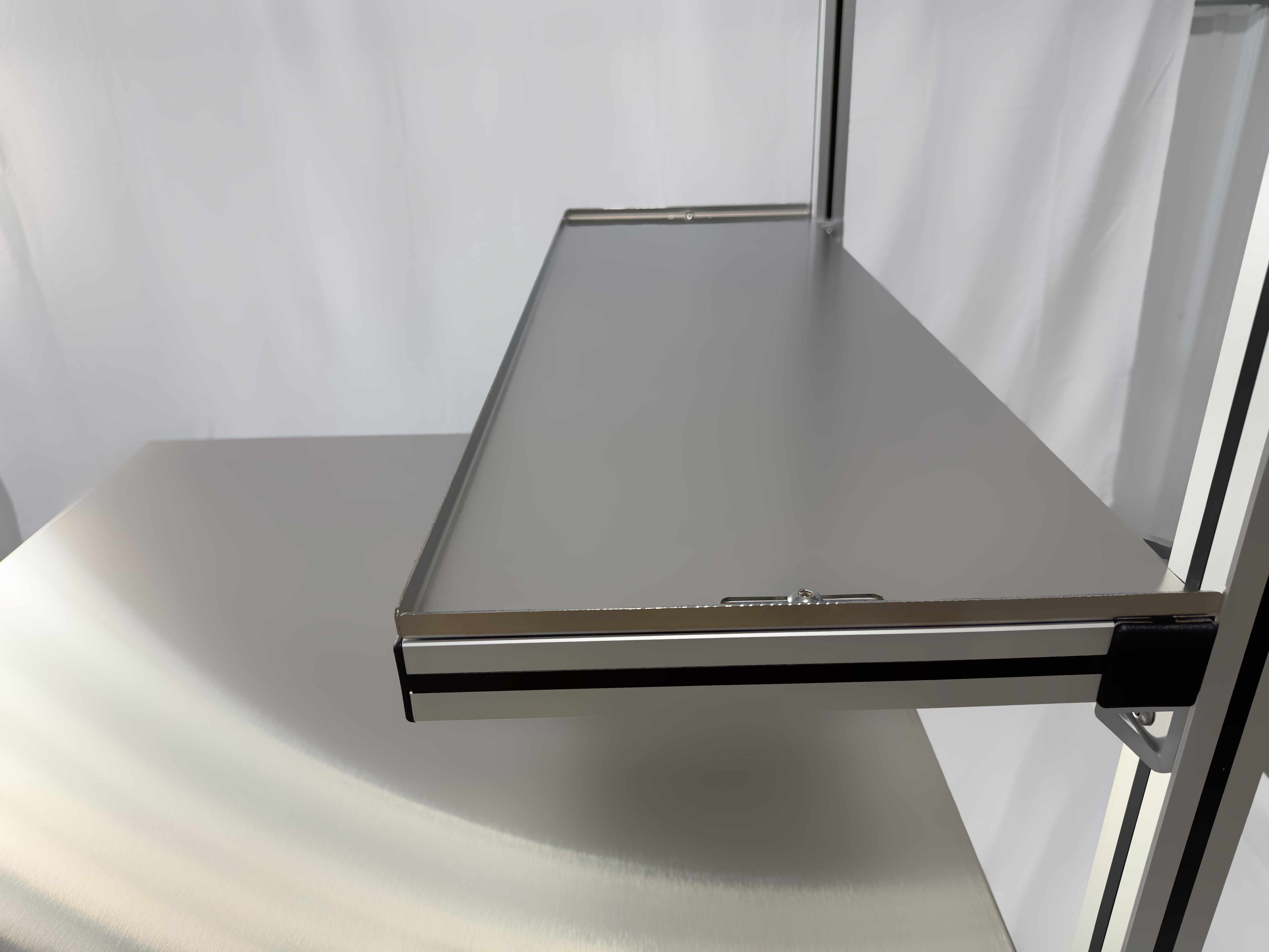 Close up of workstation shelf