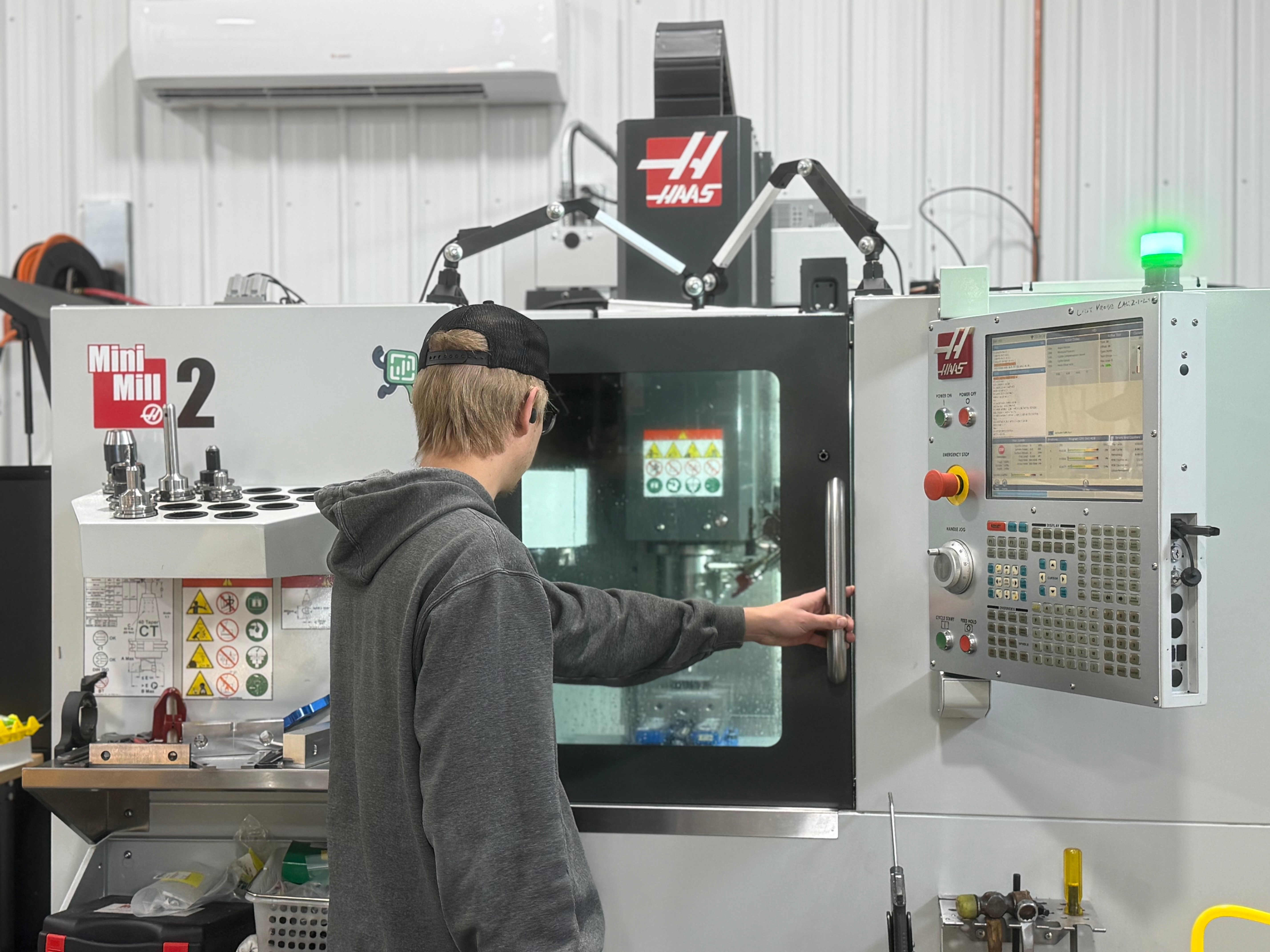 Man working on a CNC machine